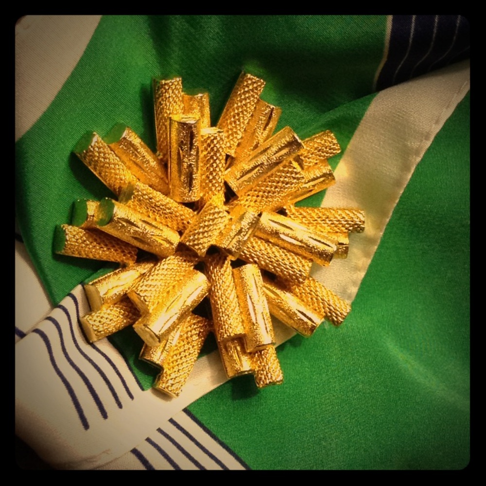 Gold color brooch. Vintage